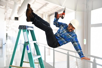 image of employee falling off ladder